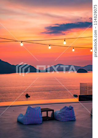 View of rooftop bar in Panwa beach at sunset, in Phuket, Thailand View of rooftop bar in Panwa beach at sunset, in Phuket, Thailand 114829075