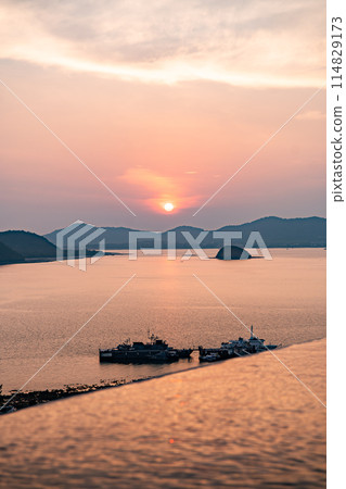 View of Cape Panwa beach at sunset, in Phuket, Thailand 114829173