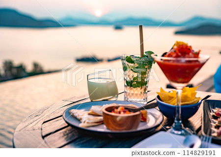 View of rooftop bar in Panwa beach at sunset, in Phuket, Thailand 114829191