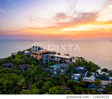 View of resort in Panwa beach at sunset, in Phuket, Thailand View of resort in Panwa beach at sunset, in Phuket, Thailand 114829222