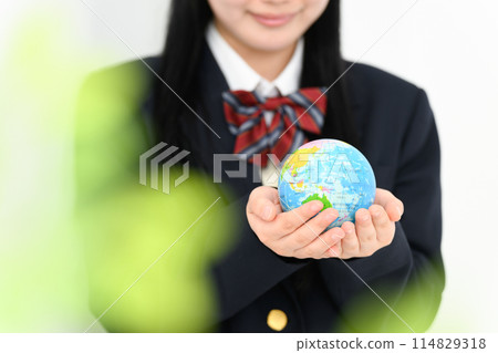 Girl holding a globe Global warming Eco 114829318