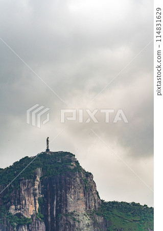 Majestic Side View of Christ the Redeemer in Rio with Tourists Majestic Side View of Christ the Redeemer in Rio with Tourists 114831629