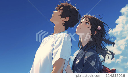 Young man and woman looking up at the sky, she in a yukata 114832016
