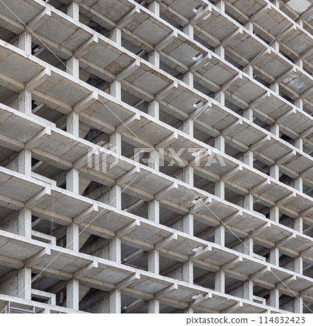 large multi-storey apartment building is under construction 114832423