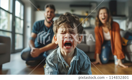 A child cries while parents argue in the background. The crying child highlights the emotional pain and turmoil caused by parental arguments. Generative AI. A child cries while parents argue in the background. The crying child highlights the emotional pain and turmoil caused by parental arguments. Generative AI. 114832801
