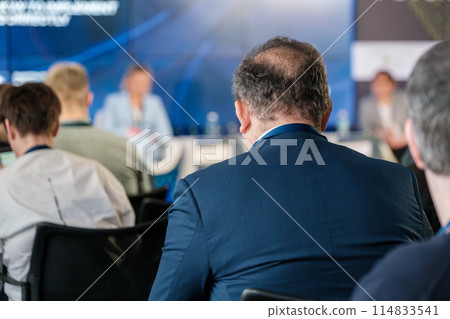 Audience attending a business conference or seminar session 114833541