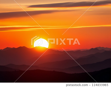 sunset over mountains 114833965