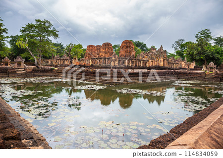 Fantastic ancient ruins of Prasat Muang Tam with a sacred well surrounding it near Phanom Rung Prasat Historical Park. Buriram Province, Thailand Fantastic ancient ruins of Prasat Muang Tam with a sacred well surrounding it near Phanom Rung Prasat Historical Park. Buriram Province, Thailand 114834059