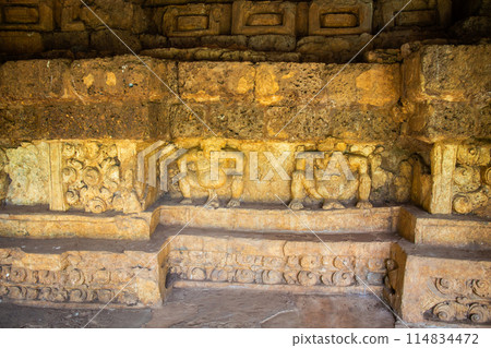 Ancient stone carvings depict mythical dwarf gods. On a stone wall from the Dvaravati period in Si Thep Historical Park, Phetchabun, Thailand, has been registered as a World Heritage Site. Ancient stone carvings depict mythical dwarf gods. On a stone wall from the Dvaravati period in Si Thep Historical Park, Phetchabun, Thailand, has been registered as a World Heritage Site. 114834472