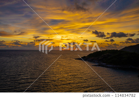 Laem Phromthep at sunset in the evening is a romantic and popular place to view the sun. 114834782