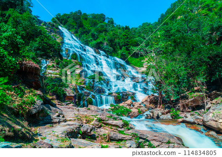 Amazing deep forest big waterfall at Mae Ya waterfall, Doi Inthanon national park Chiangmai, Thailand. Translate text " Mae Ya waterfall " Amazing deep forest big waterfall at Mae Ya waterfall, Doi Inthanon national park Chiangmai, Thailand. Translate text " Mae Ya waterfall " 114834805