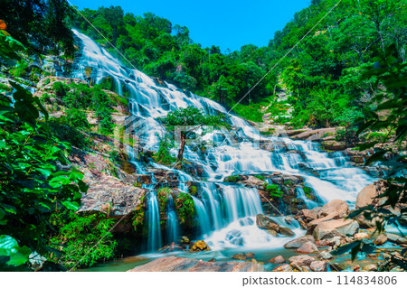 Amazing deep forest big waterfall at Mae Ya waterfall, Doi Inthanon national park Chiangmai, Thailand. Translate text " Mae Ya waterfall " Amazing deep forest big waterfall at Mae Ya waterfall, Doi Inthanon national park Chiangmai, Thailand. Translate text " Mae Ya waterfall " 114834806
