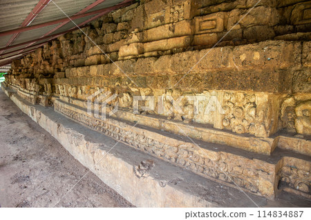 Ancient stone carvings depicting legendary animals or deities on a Dvaravati period stone wall in Si Thep Historical Park, Phetchabun, Thailand, registered as a World Heritage Site. Ancient stone carvings depicting legendary animals or deities on a Dvaravati period stone wall in Si Thep Historical Park, Phetchabun, Thailand, registered as a World Heritage Site. 114834887