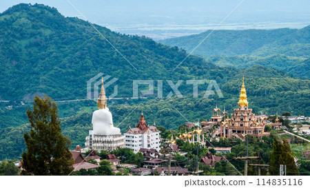 Wat Phra That Pha Son Kaew, wide view with mountain views and sky when it's cloudy. It is a popular destination for tourists. Wat Phra That Pha Son Kaew, wide view with mountain views and sky when it's cloudy. It is a popular destination for tourists. 114835116
