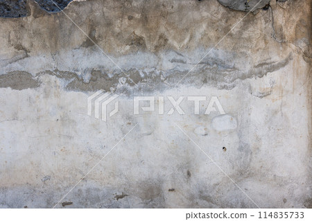 Old water damaged plaster wall surface - full-frame background and texture 114835733