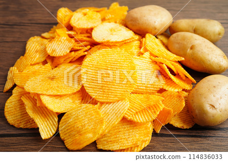 Potato chips fried snack unhealthy fast food. Potato chips fried snack unhealthy fast food. 114836033