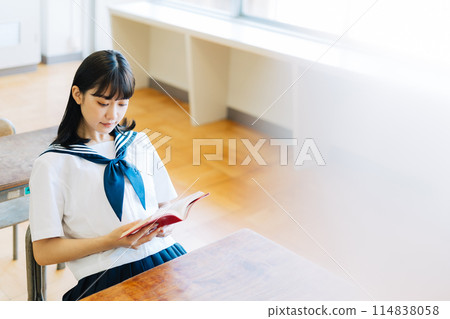 High school students reading in the classroom High school students reading in the classroom 114838058