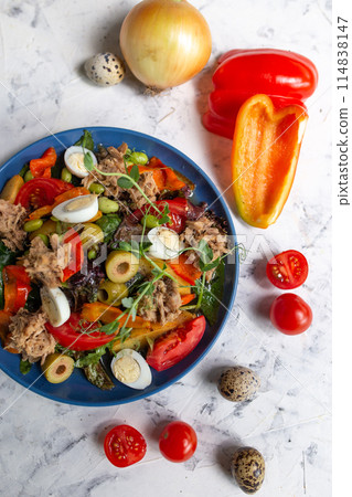 nicoise salad on the table with vegetables top view nicoise salad on the table with vegetables top view 114838147