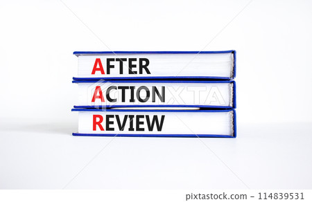 AAR After action review symbol. Concept words AAR After action review on beautiful books. Beautiful white background. Business AAR after action review concept. Copy space. AAR After action review symbol. Concept words AAR After action review on beautiful books. Beautiful white background. Business AAR after action review concept. Copy space. 114839531