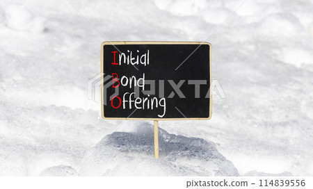 IBO initial bond offering symbol. Concept words IBO initial bond offering on beautiful yellow blackboard. Beautiful white snow background. Business IBO initial bond offering concept. Copy space. 114839556
