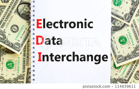 EDI electronic data interchange symbol. Concept words EDI electronic data interchange on white note. Beautiful dollar bills background. Business and EDI electronic data interchange concept. Copy space EDI electronic data interchange symbol. Concept words EDI electronic data interchange on white note. Beautiful dollar bills background. Business and EDI electronic data interchange concept. Copy space 114839611
