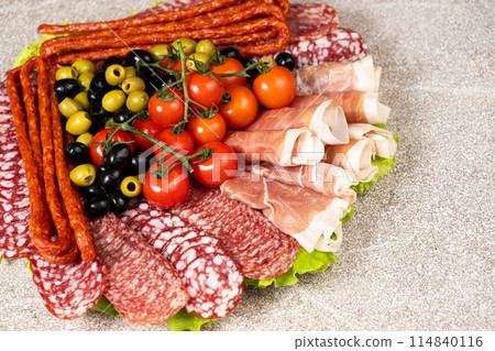 Beautiful serving of sausage sliced meat delicacies 114840116
