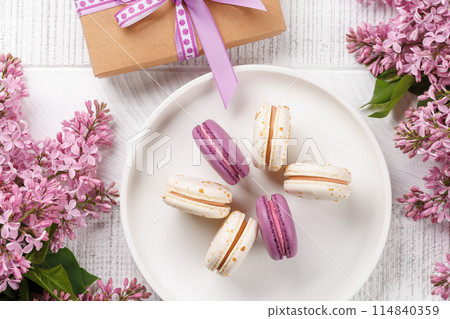 Colorful macaroons, arranged in a delightful display of vibrant hues Colorful macaroons, arranged in a delightful display of vibrant hues 114840359