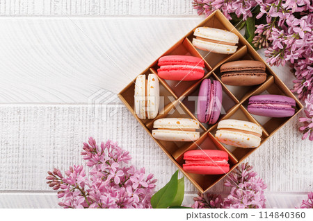 Colorful macaroons, arranged in a delightful display of vibrant hues Colorful macaroons, arranged in a delightful display of vibrant hues 114840360