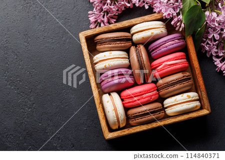 Colorful macaroons, arranged in a delightful display of vibrant hues Colorful macaroons, arranged in a delightful display of vibrant hues 114840371