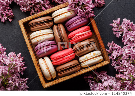 Colorful macaroons, arranged in a delightful display of vibrant hues Colorful macaroons, arranged in a delightful display of vibrant hues 114840374