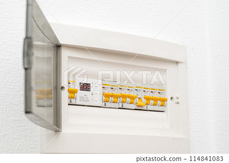 Electrical cabinet with automatic fuses. Electrical distribution box. Fuse block. 114841083