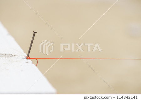 String net placed on spike nail 114842141