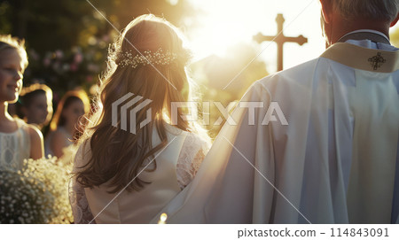 Girl with Priest During First Communion Ceremony - A Moment of Spiritual Significance 114843091