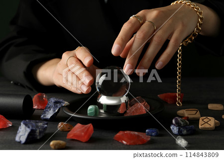Magic orb of a witch, for divination of the future, on a dark background. Magic orb of a witch, for divination of the future, on a dark background. 114843809