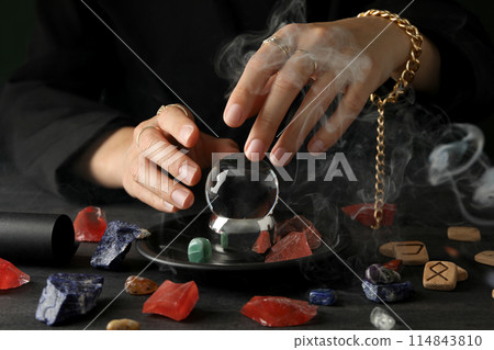 Magic orb of a witch, for divination of the future, on a dark background. Magic orb of a witch, for divination of the future, on a dark background. 114843810