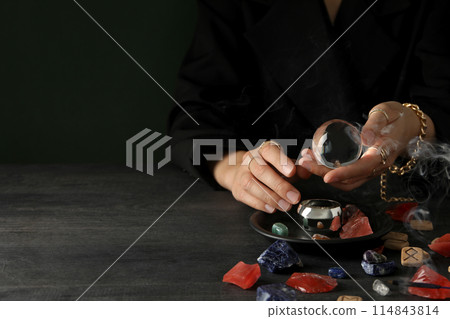 Magic orb of a witch, for divination of the future, on a dark background. 114843814