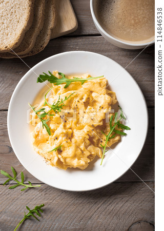 Scrambled eggs and coffee 114846538