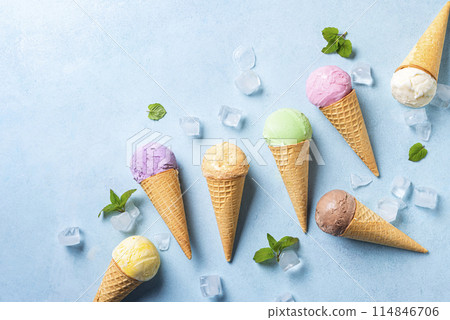 Various ice cream scoops in cones 114846706