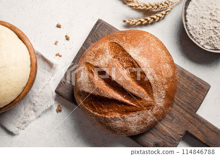 Fresh Sourdough Bread and ingredients. Bread making. Fresh Sourdough Bread and ingredients. Bread making. 114846788