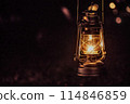 Glow of a vintage oil lantern 114846859