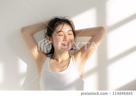 A young Japanese woman basking in the morning sunshine (AI-generated image) A young Japanese woman basking in the morning sunshine (AI-generated image) 114846885