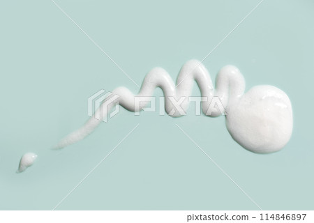 Cosmetic cream gel texture on green background 114846897