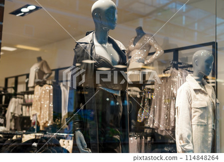 Fashion luxury clothes display. mannequins in stylish clothes Fashion luxury clothes display. mannequins in stylish clothes 114848264