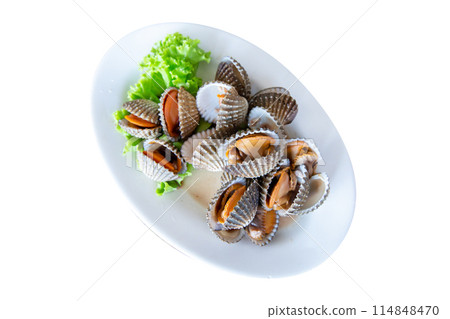 Top view of Steamed blanched clams with lettuce, focus selective 114848470