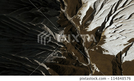 Aerial top view of the mysterious mountain rocks. Clip. White stone layers and brown ground. 114848576