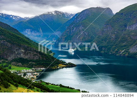 A big cruise liner in Sunnylvsfjorden fjord near Geiranger village 114848894
