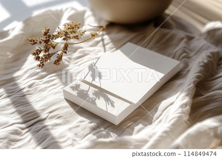 Boho Chic Business Card Mockup with Dry Flowers on Beige Boho Chic Business Card Mockup with Dry Flowers on Beige 114849474