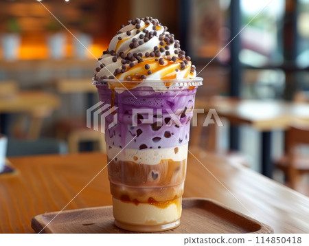 Three scoops of ice cream coffee displayed on a wooden board 114850418