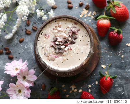 Superfood creamer almond milk, banana and coconut in a mason mug. White background with copy space. 114850440