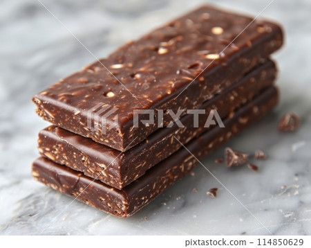 Healthy bars with nuts, seeds and dried fruits on the table, 114850629